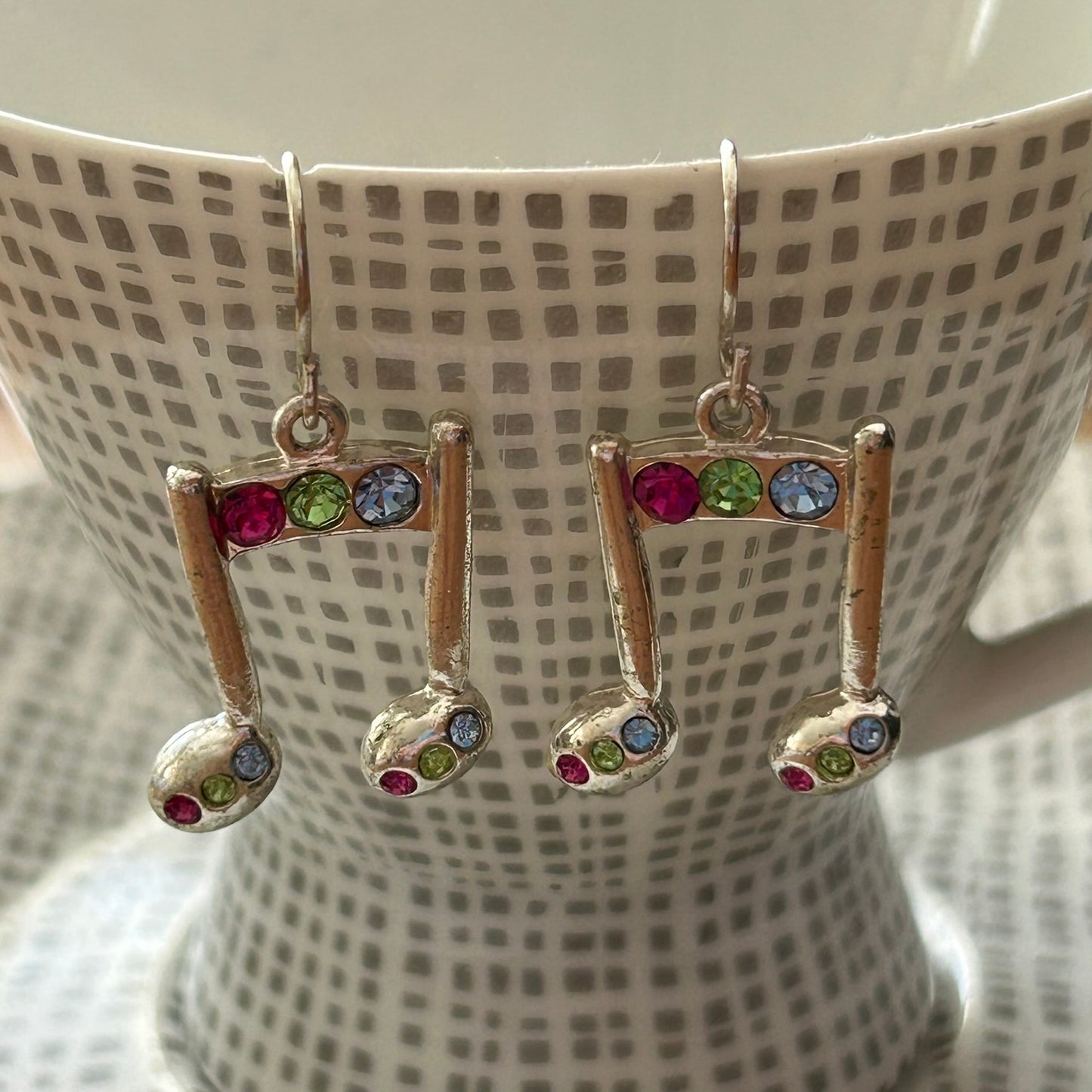 Novelty Musical Note Earrings. Colourful musical notes on silver tone metal. For pierced ears.