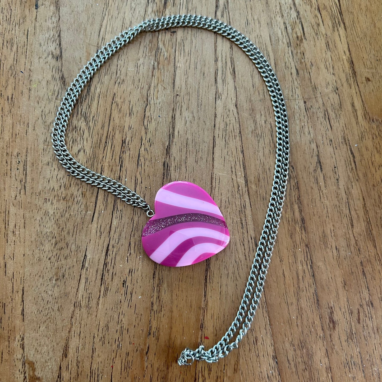 Statement Necklace. Long 32" chain. Large pink plastic heart on silver tone curb chain. Fun and colourful.