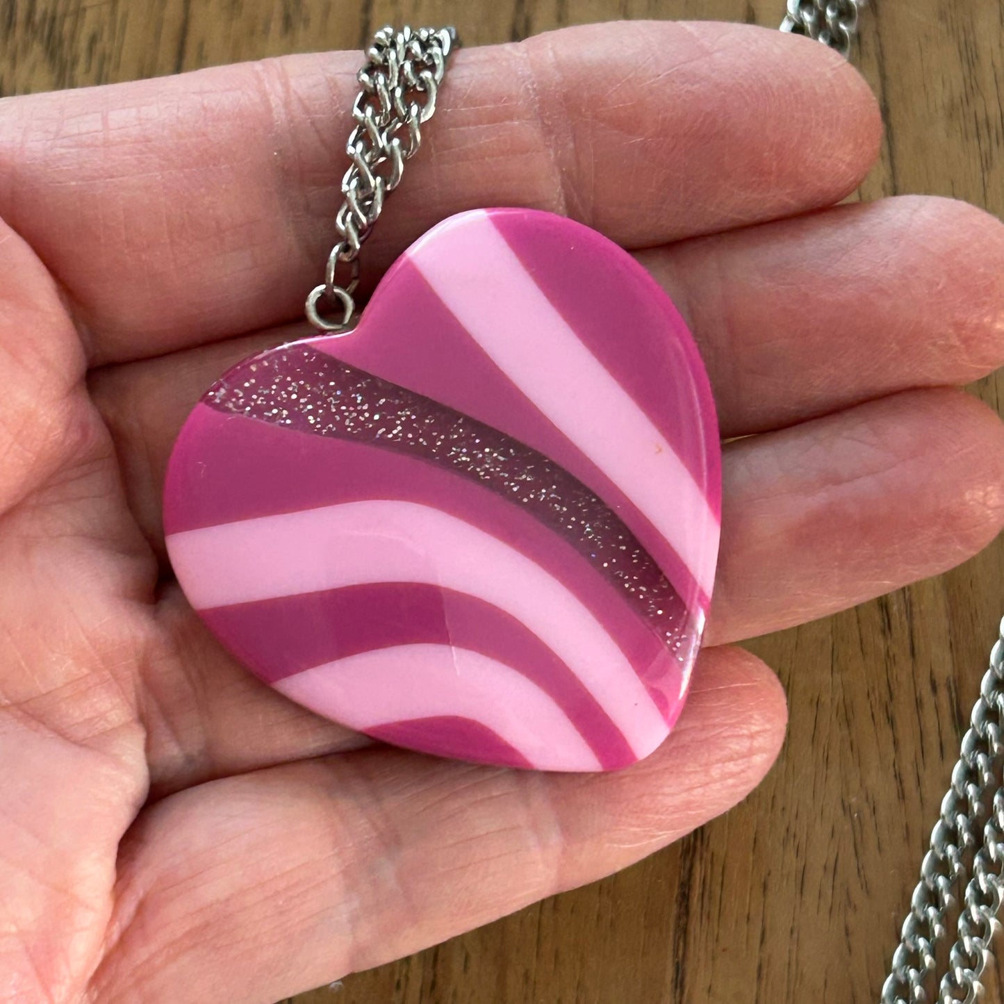 Statement Necklace. Long 32" chain. Large pink plastic heart on silver tone curb chain. Fun and colourful.