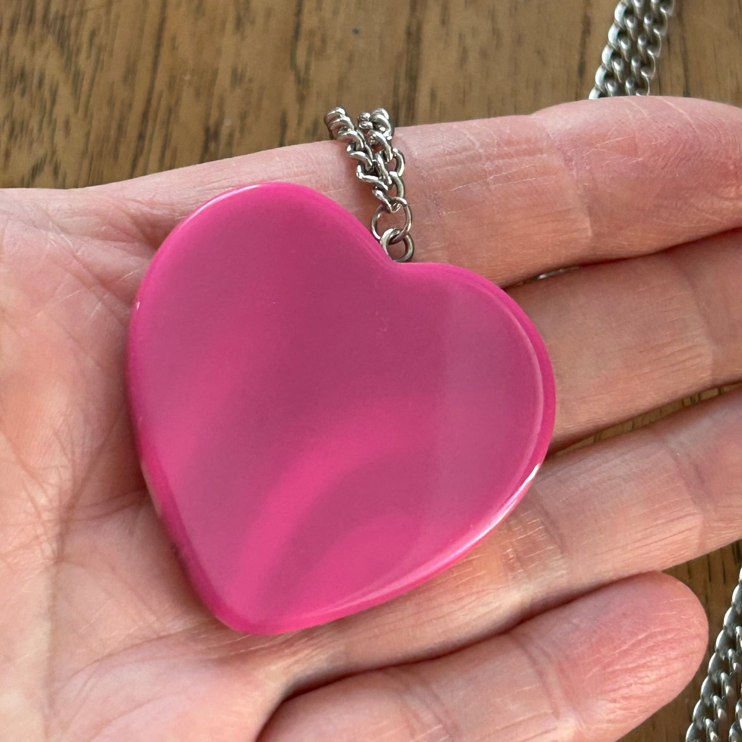 Statement Necklace. Long 32" chain. Large pink plastic heart on silver tone curb chain. Fun and colourful.