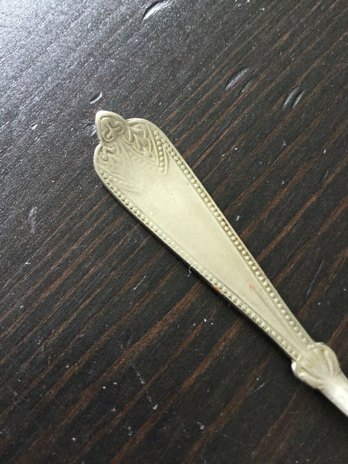 Pretty little vintage silver plated mustard spoon. Afghan F.W Silver. Approx 4" long. Fancy edge.