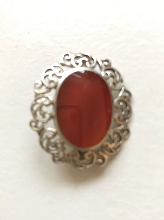 Vintage Sterling silver  carnelian brooch, oval stone ornate border brown orange