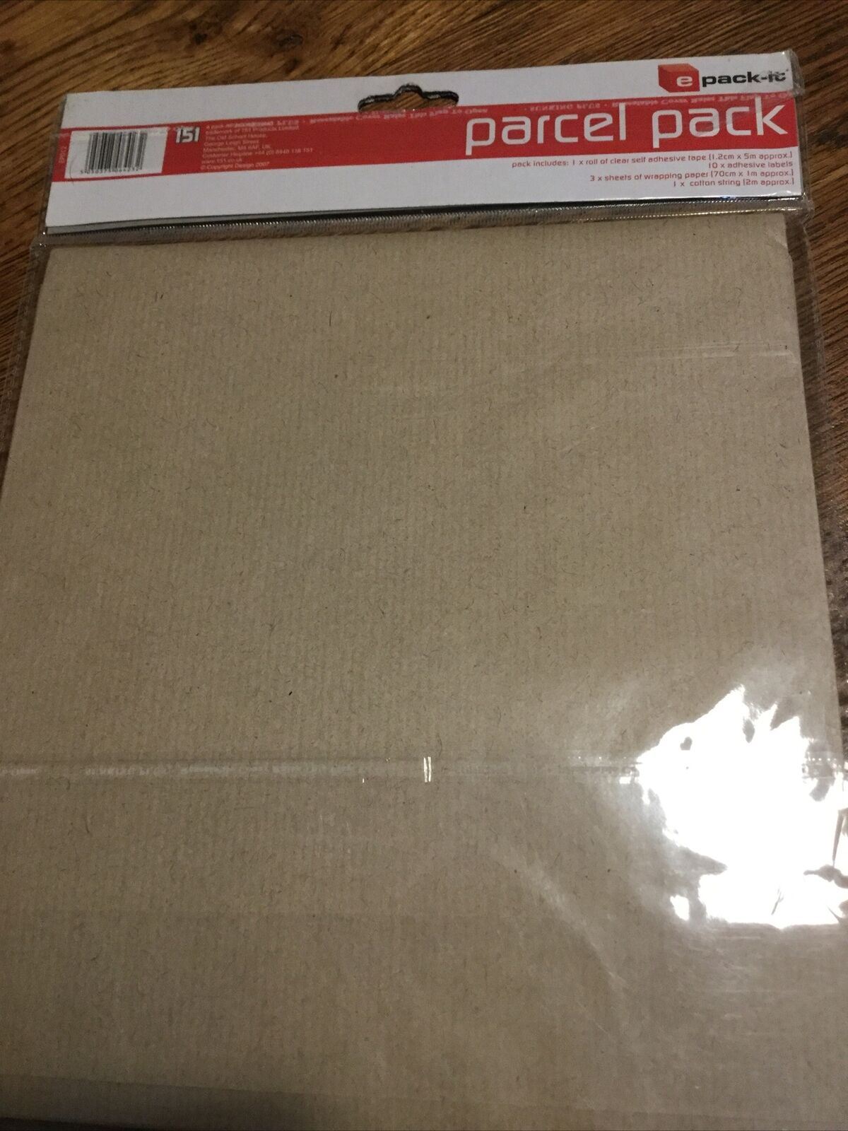 Parcel Pack. Clear Tape, 10 x Adhesive Labels, 3 x Sheets Brown Paper, String