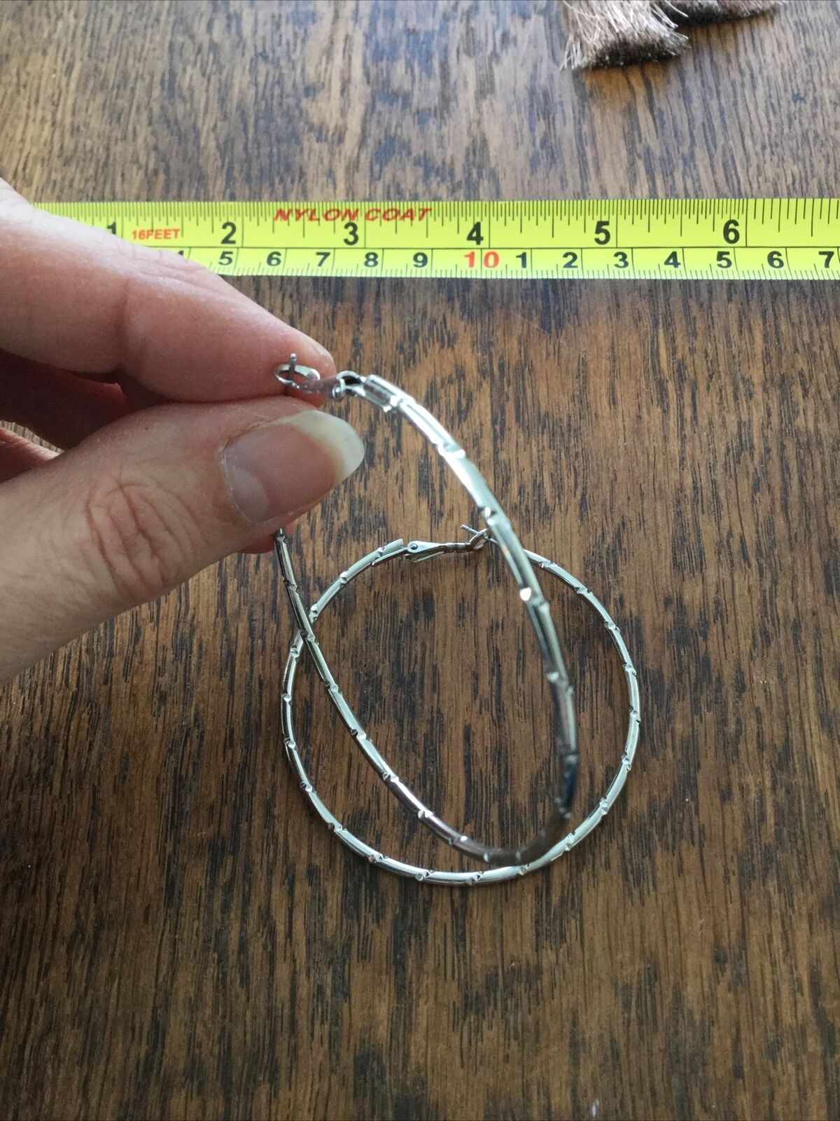 Large Silver Tone Hoop Earrings. Diamond Cut To Catch The Light. Pierced.