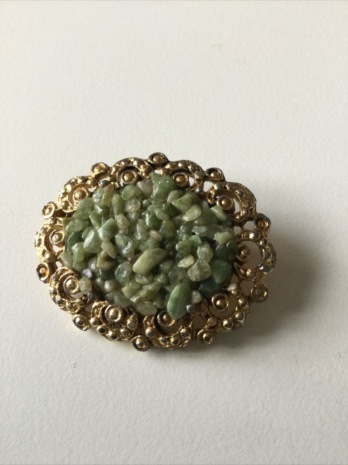 Vintage Gold Tone Brooch With Rough Green Stones In Centre. Oval. Fancy. Unusual