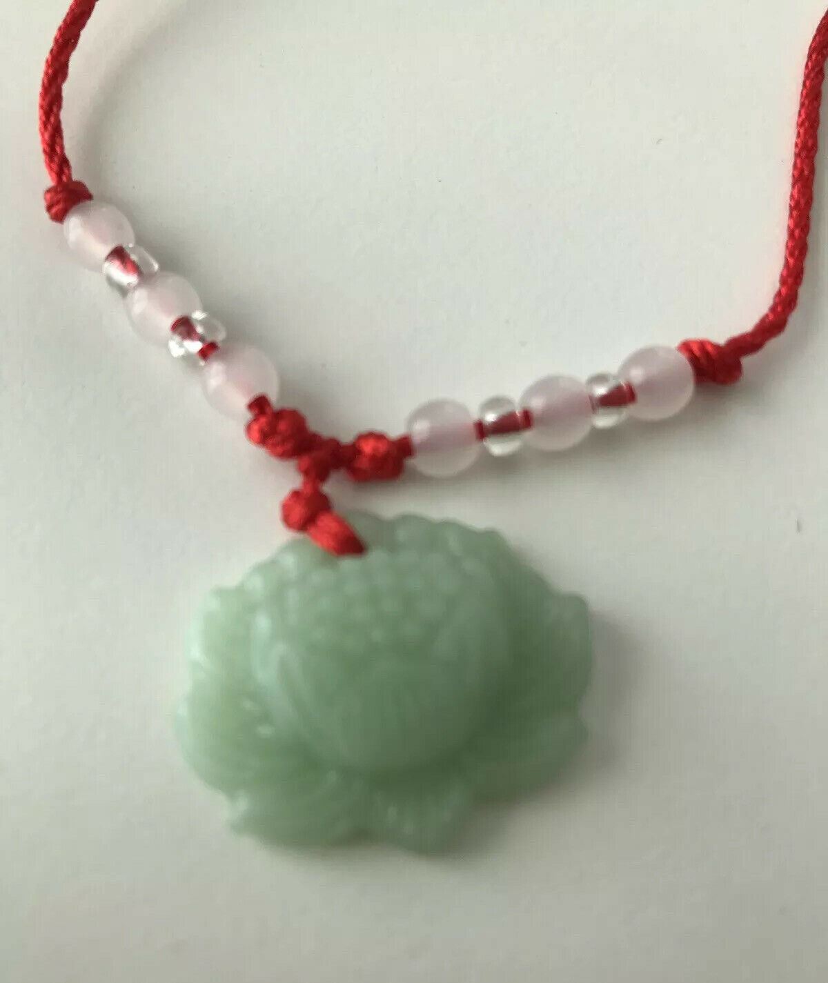 Green Jade Chinese Good Luck Pendant. Green Lotus Flower With Red Beaded Cord.