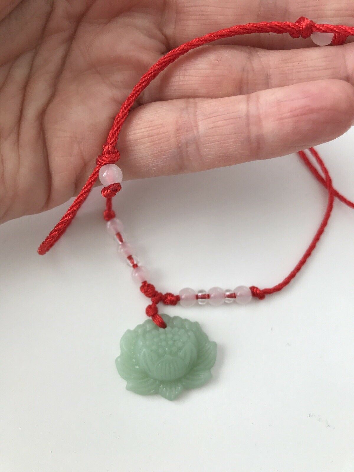 Green Jade Chinese Good Luck Pendant. Green Lotus Flower With Red Beaded Cord.