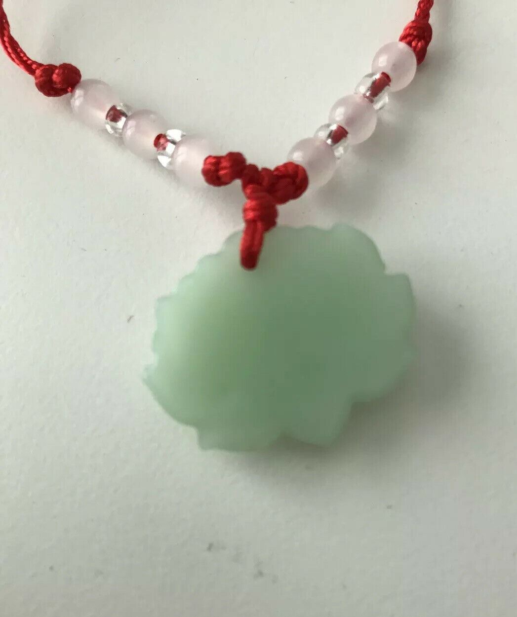 Green Jade Chinese Good Luck Pendant. Green Lotus Flower With Red Beaded Cord.