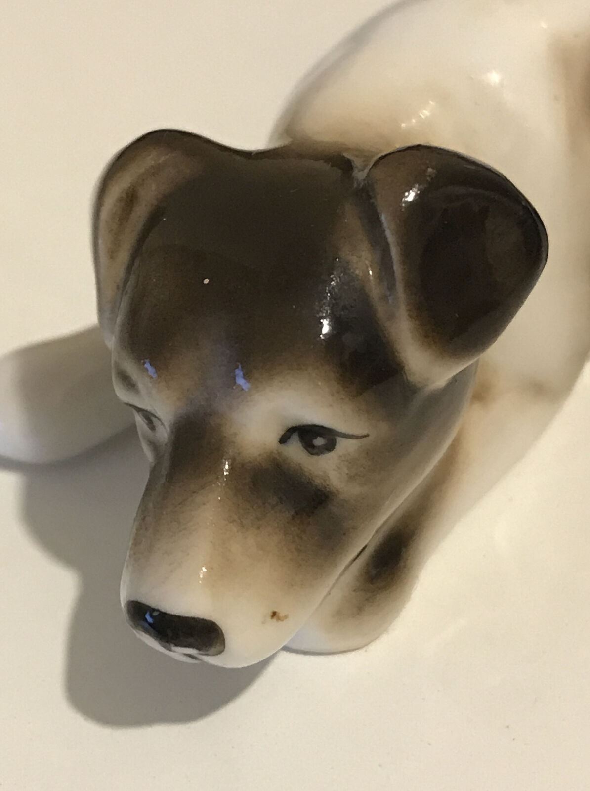 Brown And White Dog Ornament Lying Down. Cute. Miniature. Lovely Face