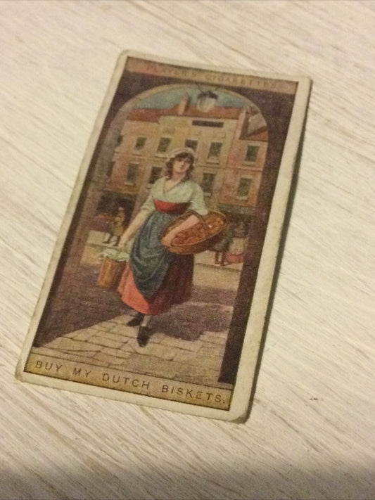 1916 Players Cigarette Card 'Cries Of London' Series 2 No 9 'Buy My Dutch Biskets' Seller. Woman selling biscuits.