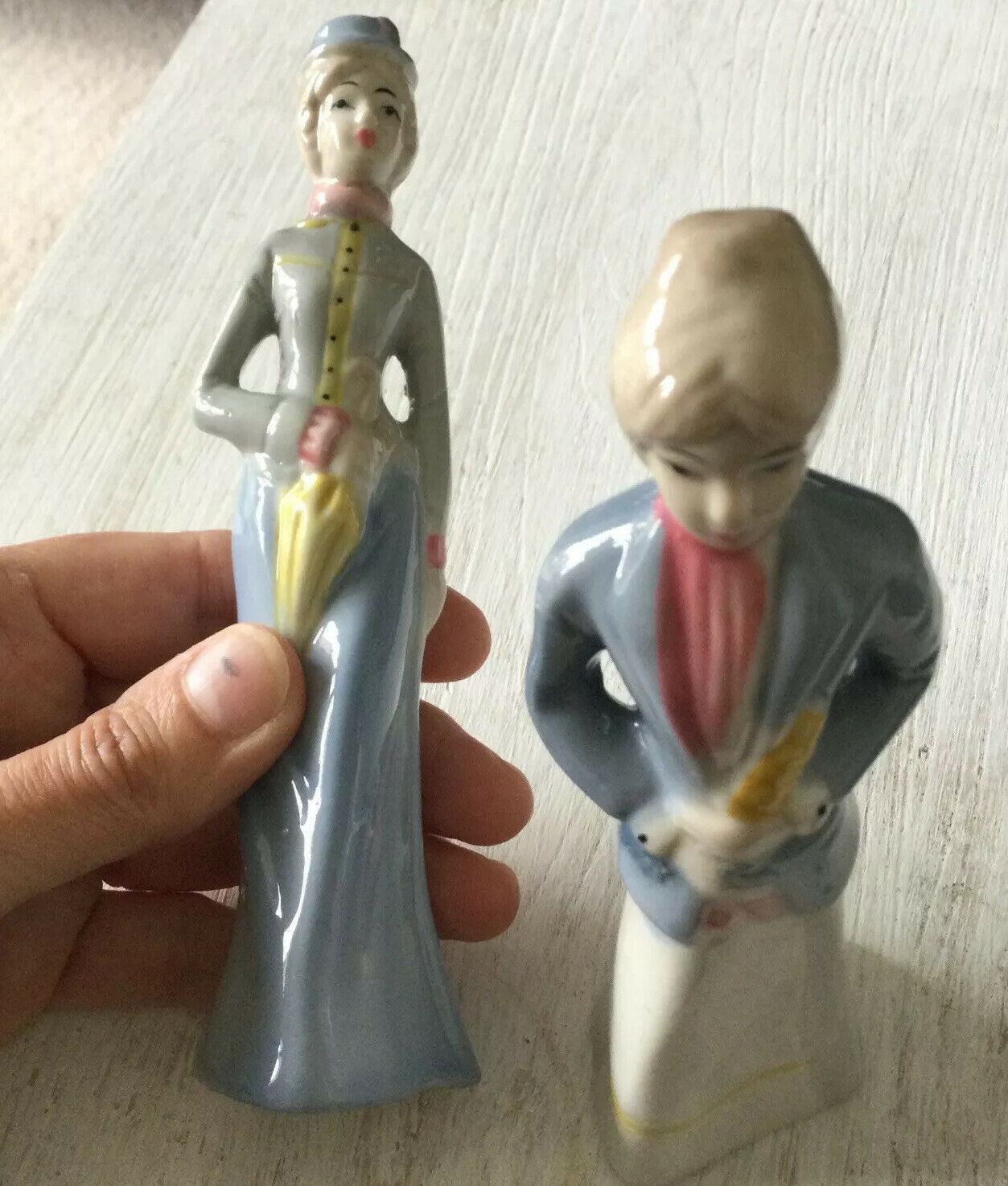 Pair Of Ceramic Lady Figurines. Blue White. Edwardian Clothes. Approx 16cm High