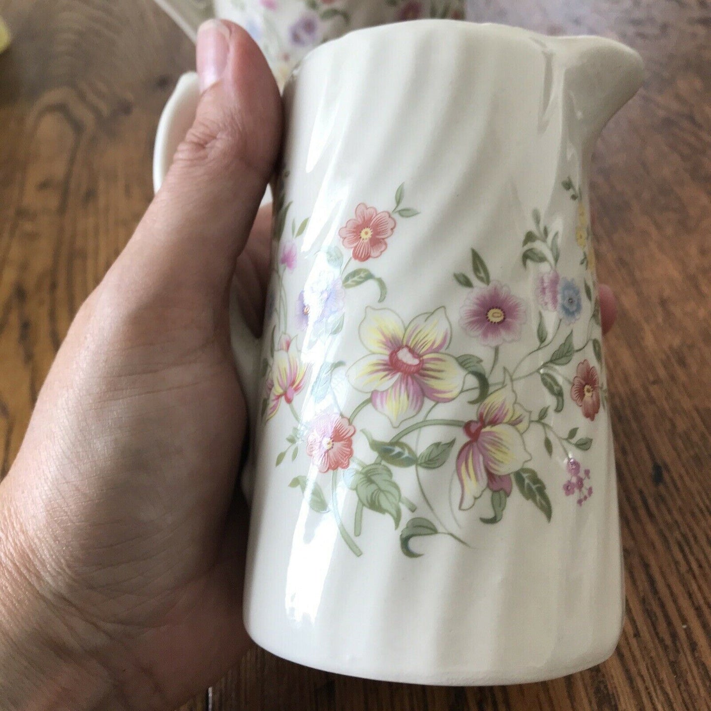 Pair Of Pretty Vintage Floral Jugs. Elegant. White With Pastel Flowers. Textured swirl design.