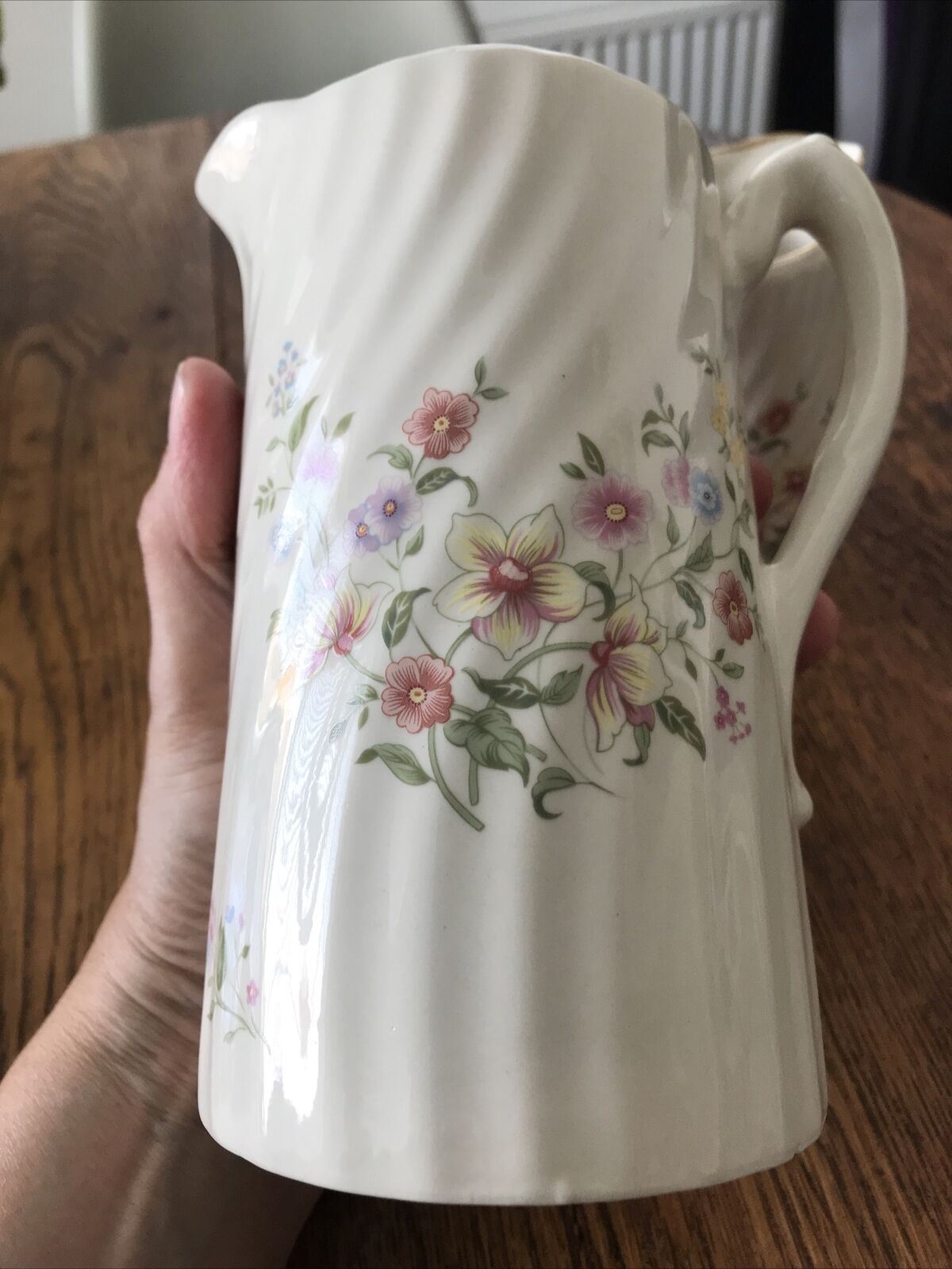 Pair Of Pretty Vintage Floral Jugs. Elegant. White With Pastel Flowers. Textured swirl design.