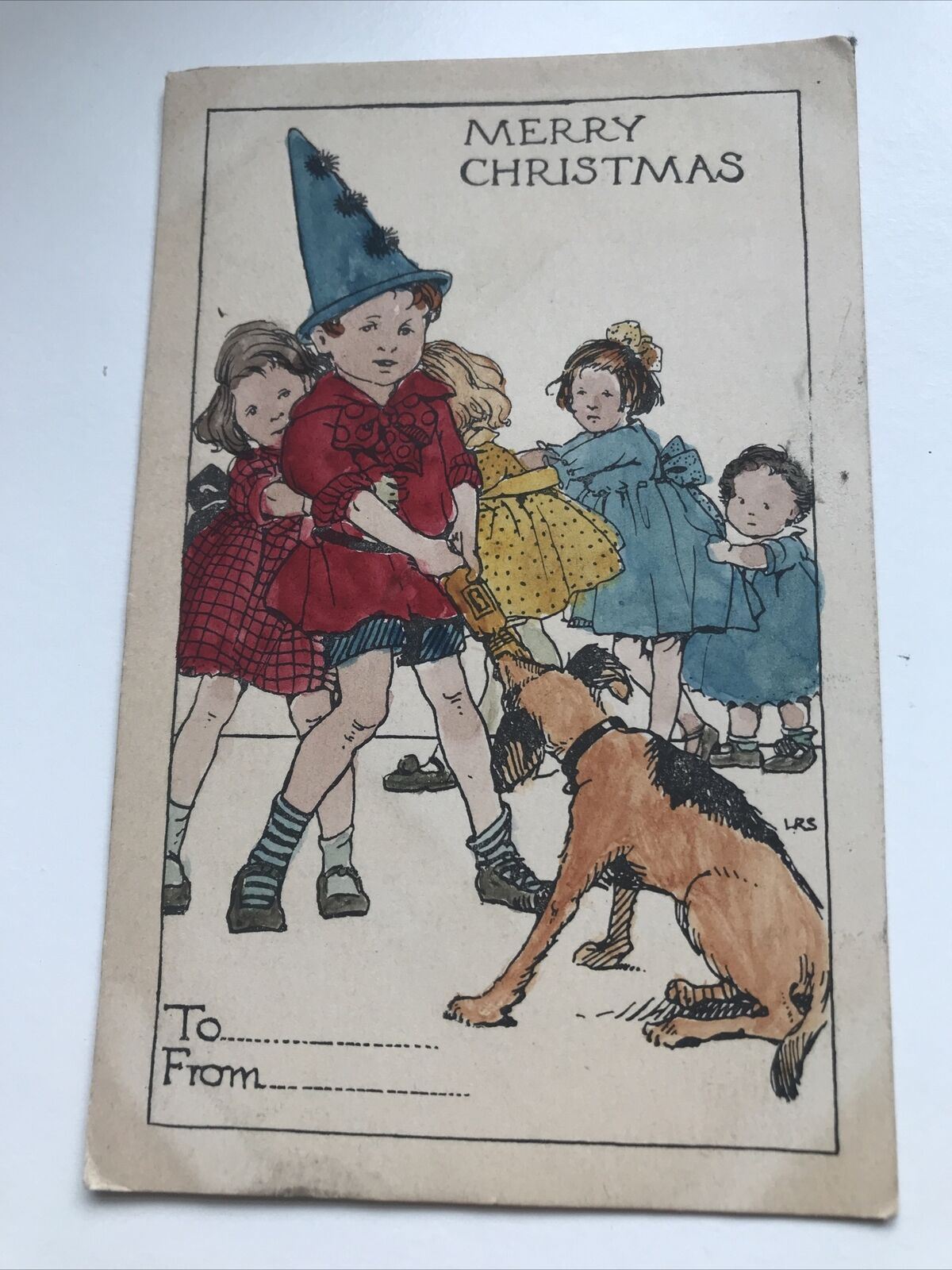 Vintage Merry Christmas Postcard Coloured In By Child. Dog Pulling Cracker.