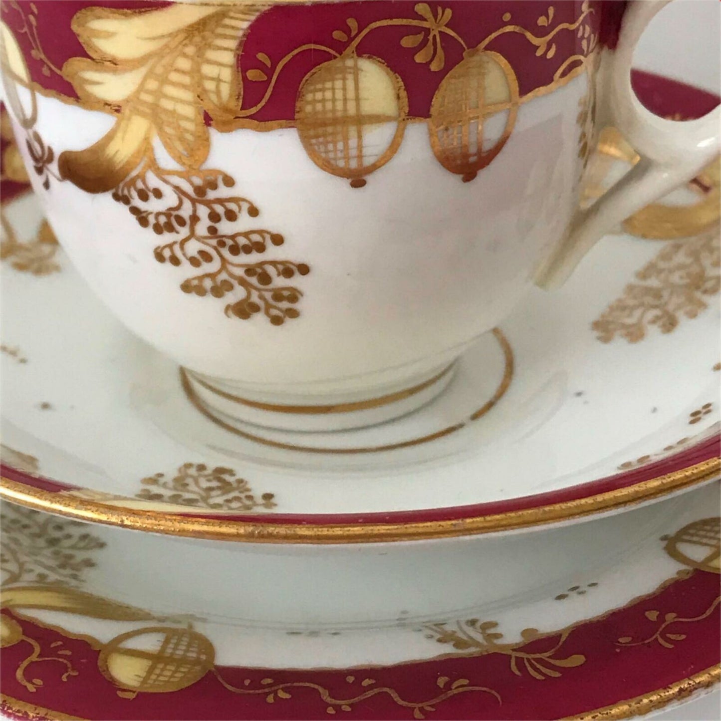 Beautiful bone china trio- cup, saucer, side plate. Deep pink & gold c.1920s Festive Christmas