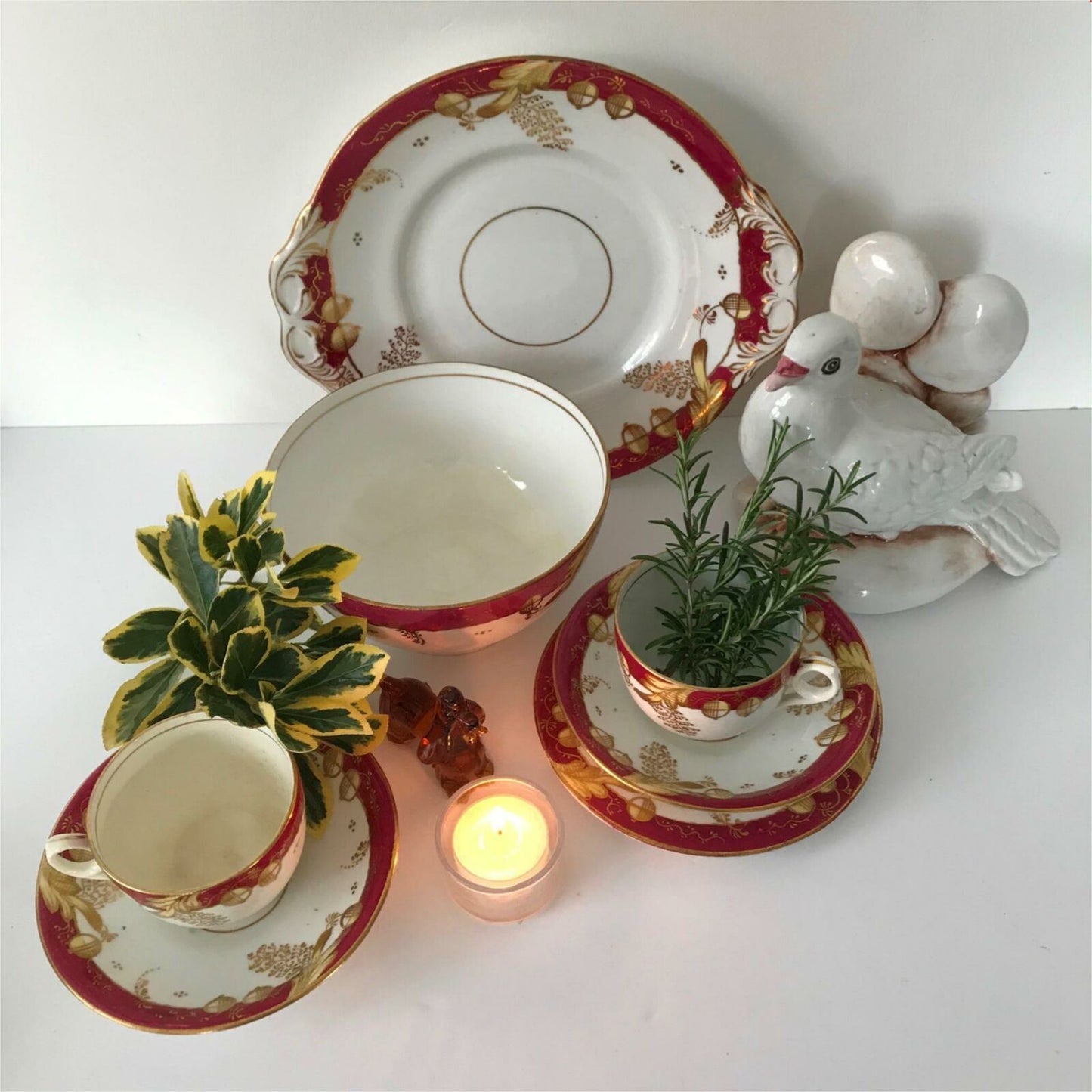 Beautiful bone china trio- cup, saucer, side plate. Deep pink & gold c.1920s Festive Christmas