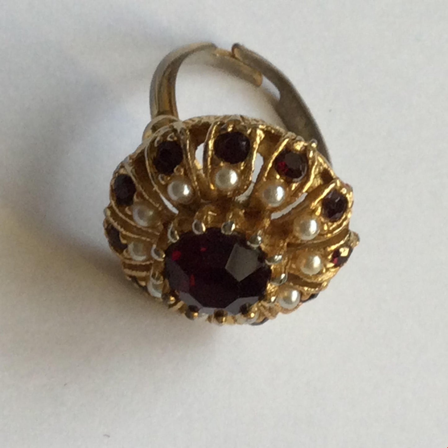 Bold vintage costume ring - gold tone, garnet colour stones and simulated pearls