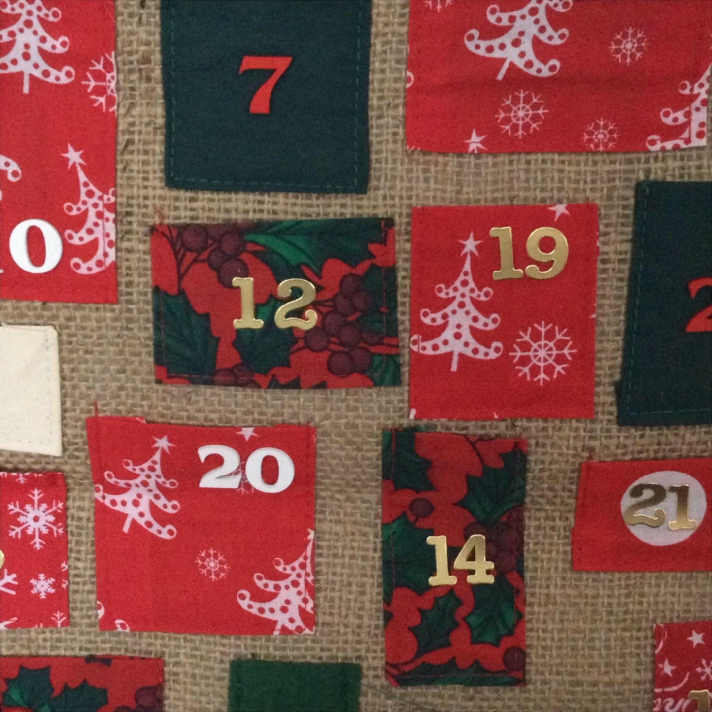 Handmade Advent Calendar with pockets for gifts. Hessian, red & Green rustic