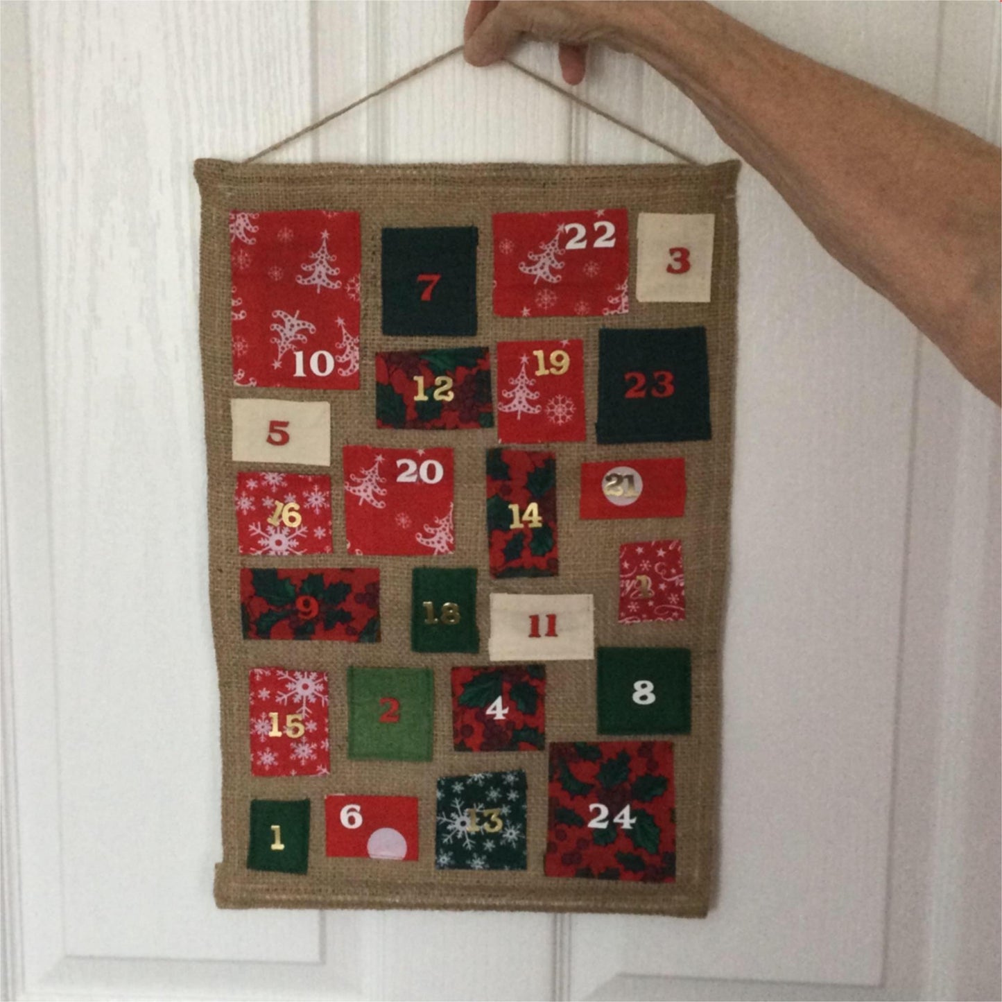 Handmade Advent Calendar with pockets for gifts. Hessian, red & Green rustic