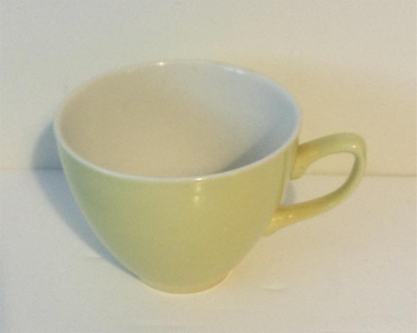 Vintage spare yellow tea cup - 1950s 1960s plain made in England classic shape