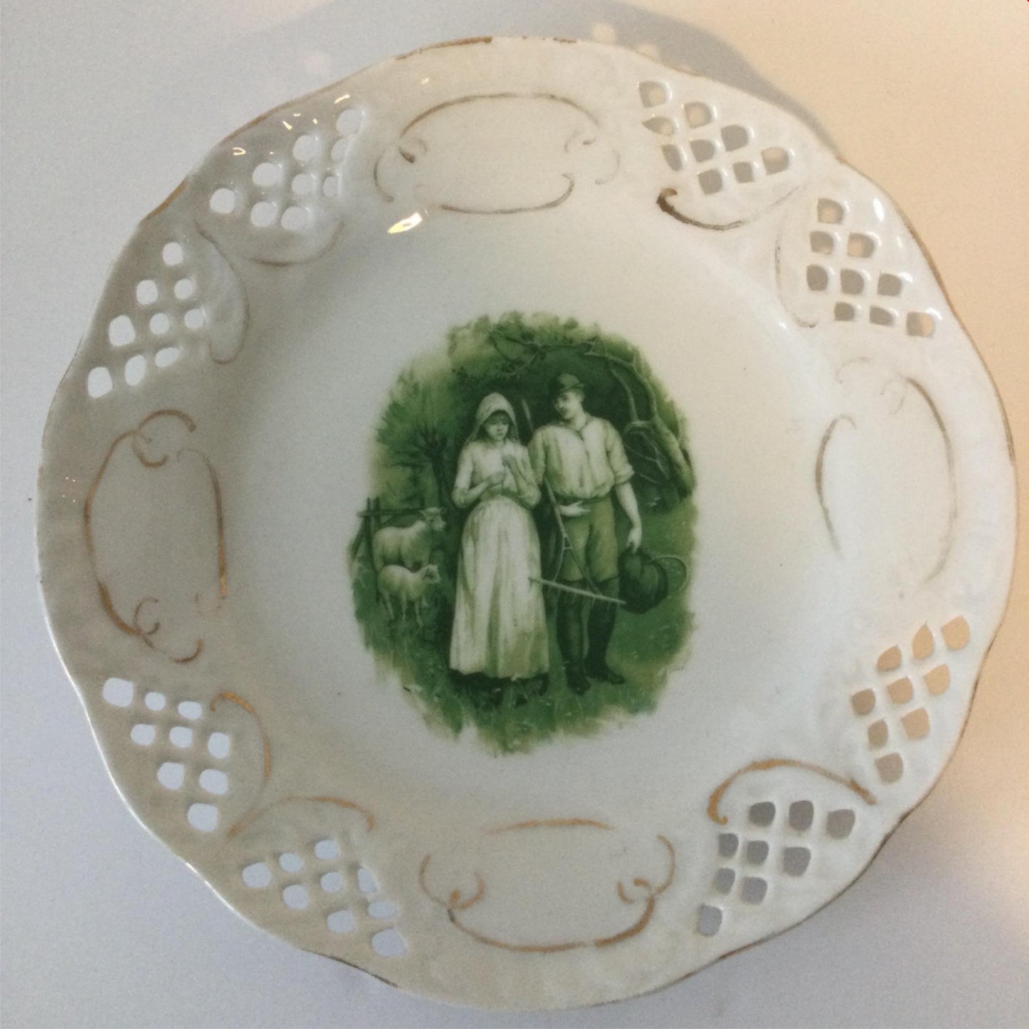 Pretty Vintage Plate, With Cut Out Detail. Green pastoral scene shepherd sheep