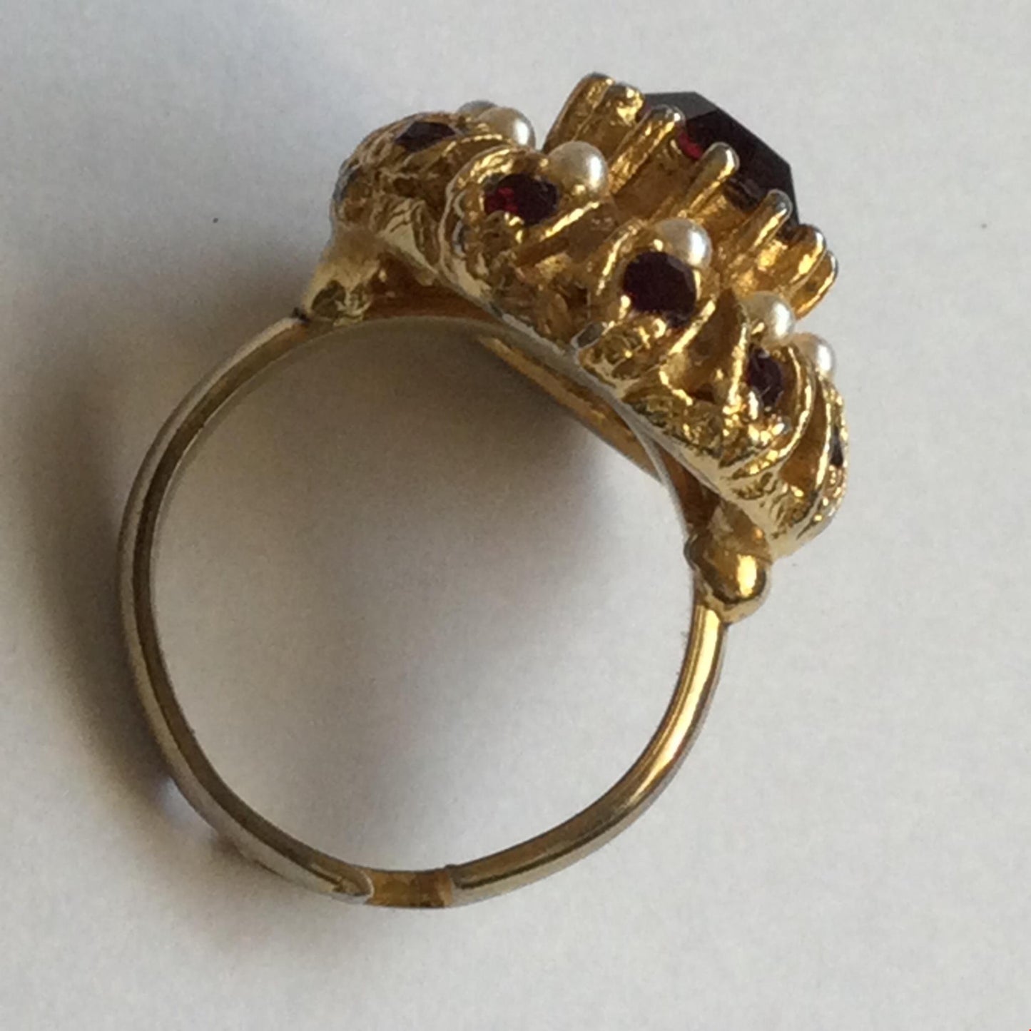 Bold vintage costume ring - gold tone, garnet colour stones and simulated pearls