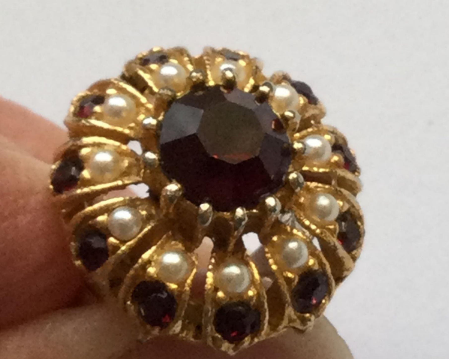 Bold vintage costume ring - gold tone, garnet colour stones and simulated pearls