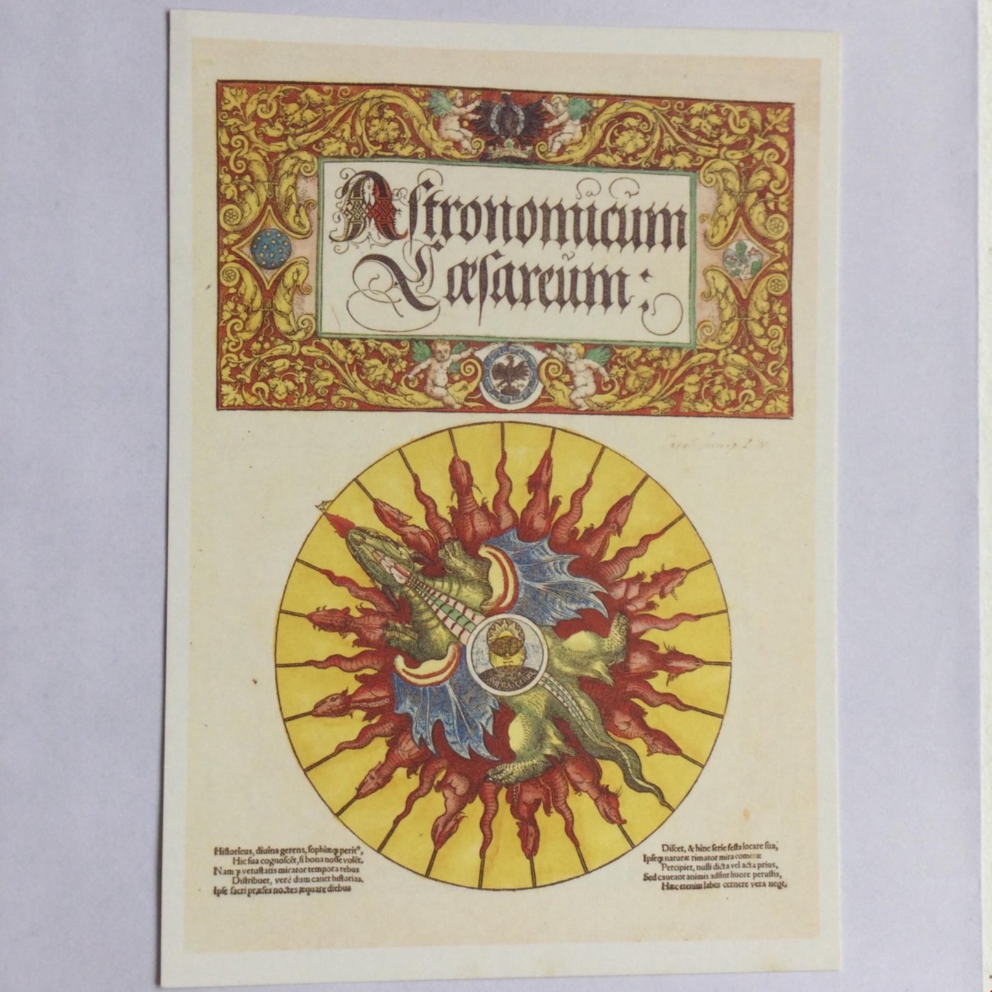 POSTCARD OF A BOOK OF VOLVELLES ASTRONOMICUM CAESAREUM PETER APIANUS TITLE PAGE