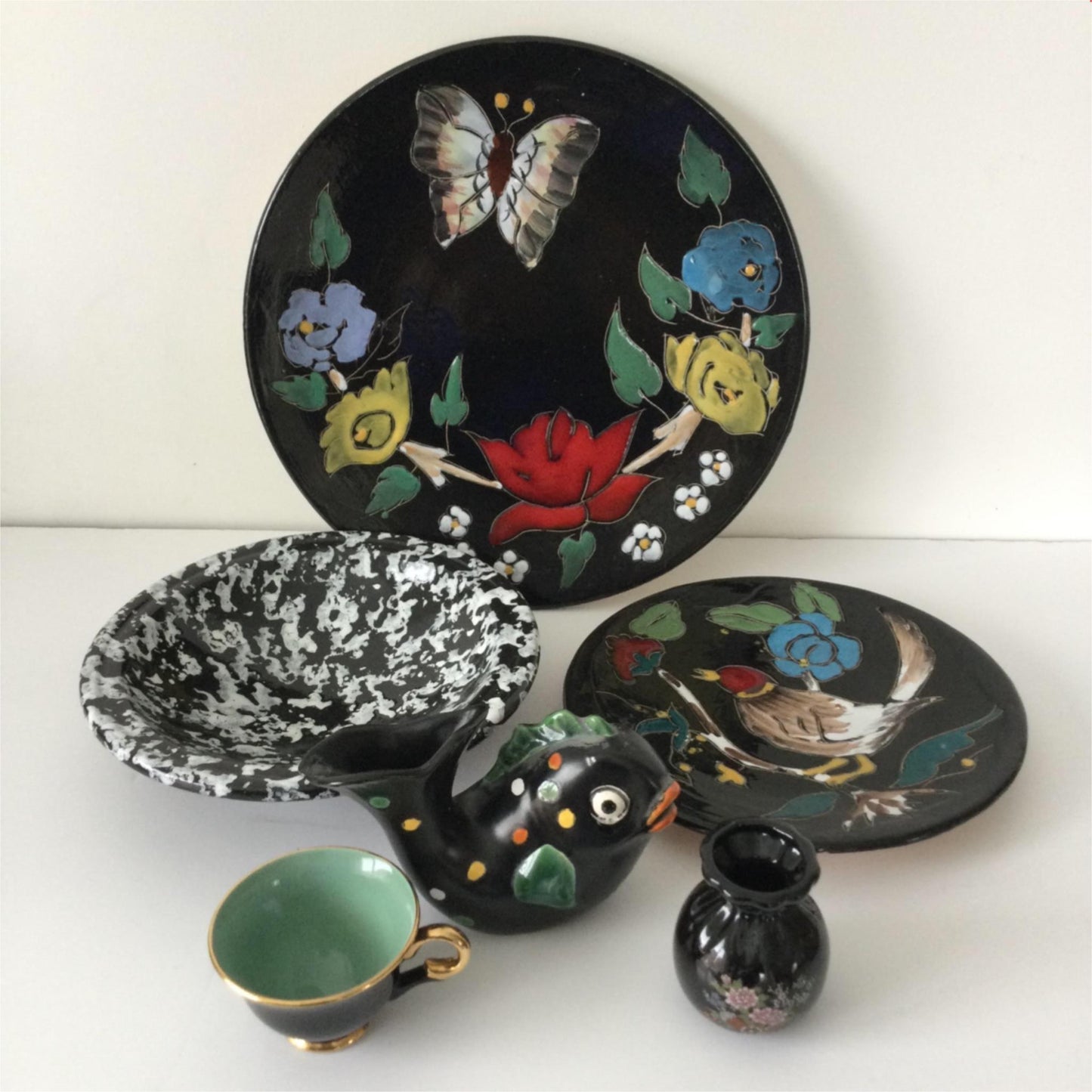 Pair of artisan plates wall decor glossy black with bright colours flowers birds