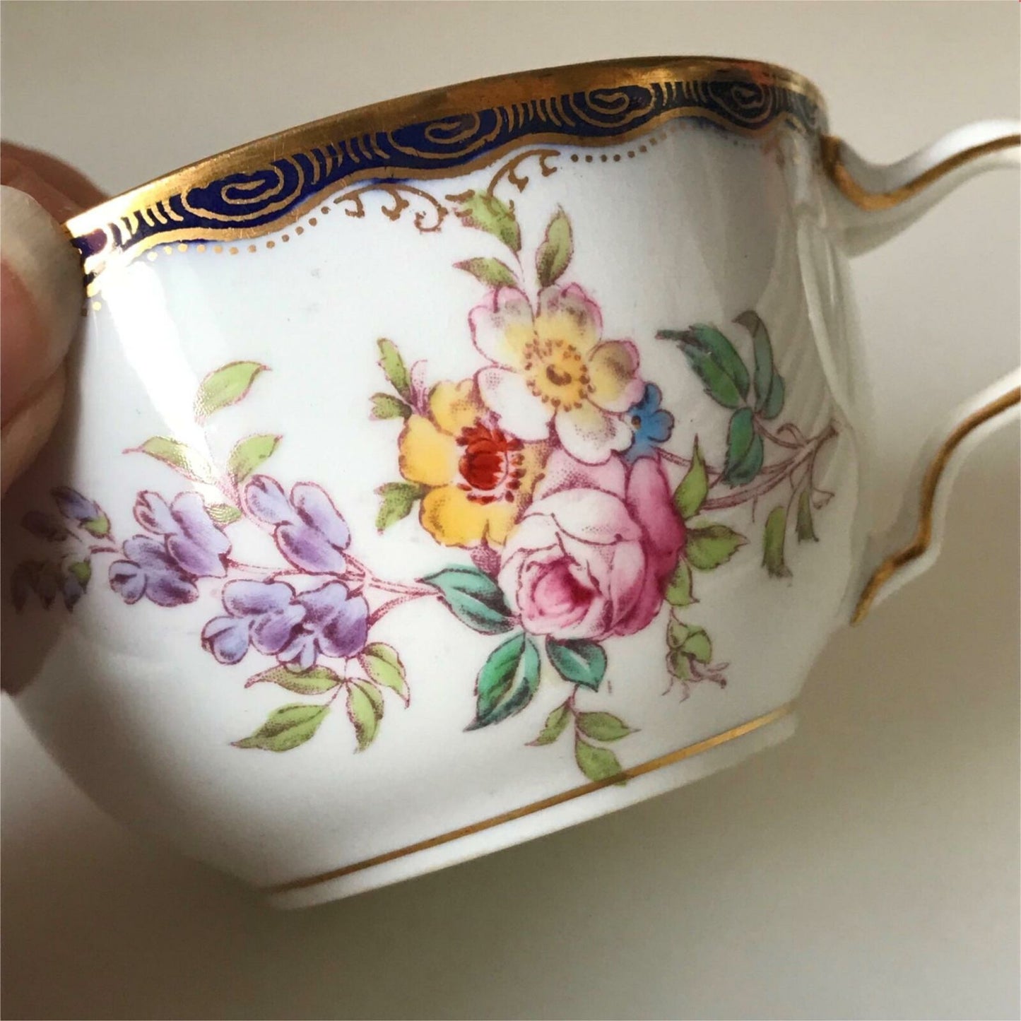 Antique Wedgwood China Cup blue/gold rim with floral sprays inside ornate handle